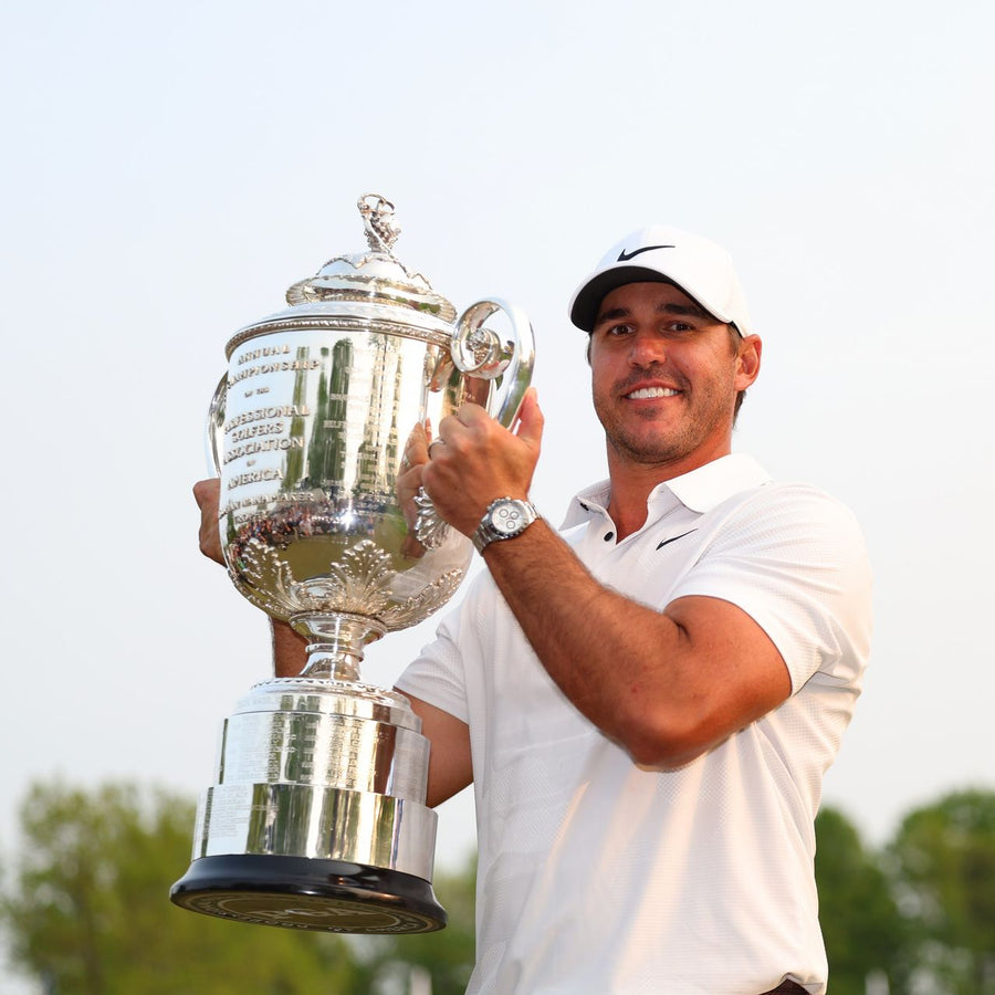 Brooks Koepka holding trophy Golf Subscription Box Golf Gear Subscription Golf Apparel and Accessories Golf Equipment Deals Golf Gift Ideas